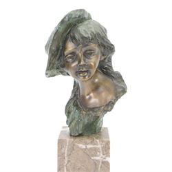 Bronze bust of a boy wearing a hat, upon a stepped marble base, H37cm