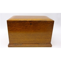  Edwardian oak correspondence box, hinged lids enclosing an fitted interior, with fold down leather writing surface, with two Gothic style brass handles, L43cm x H28cm   