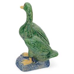 Pair of 20th century Chinese standing ducks, standing on a mottled base, H20cm