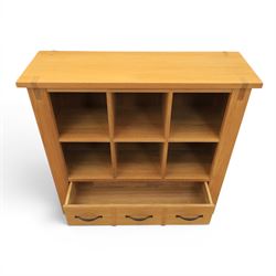 Contemporary Oak cabinet, rectangular top with tenon detailing, two open recess shelves, above a single drawer with blackened metal handles
