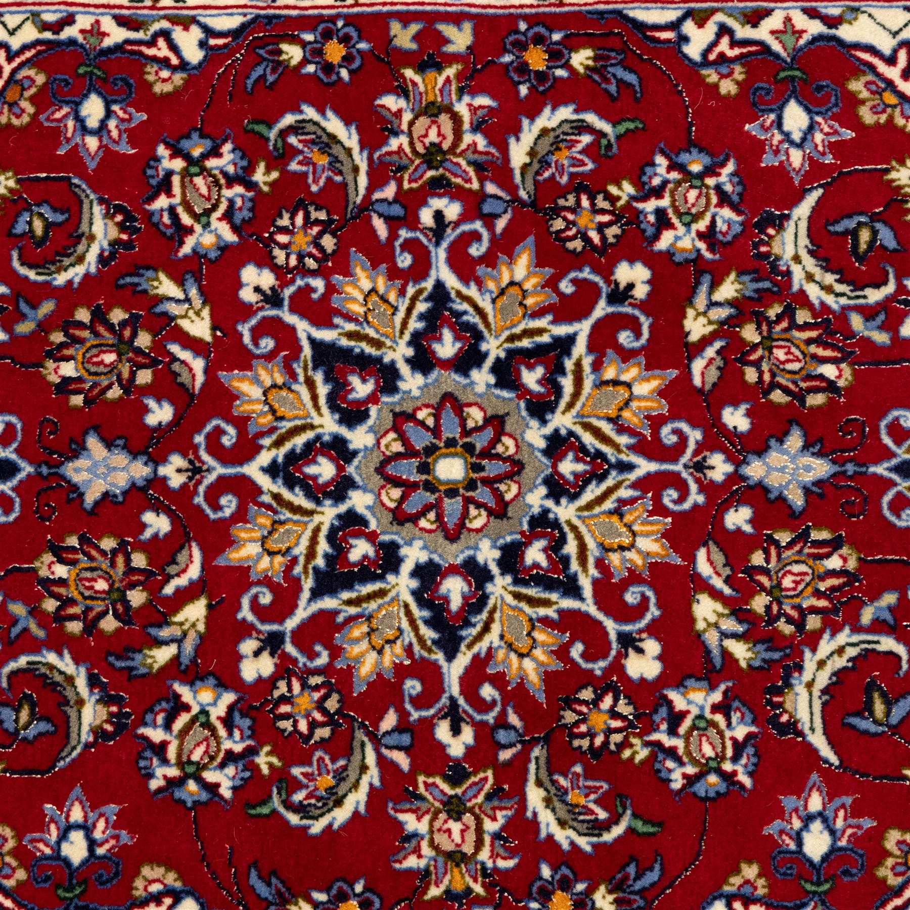 Two Central Persian rugs, ivory ground with a symmetrical foliate and floral design around a shaped cartouche medallion with a red floral and bird motif border with contrasting guard stripes, 142x76cm, Central Persian Kashan rug, crimson central field with a floral and foliate design with a stylized rosette medallion incorporating palmettes and scrolling vine work, enclosed by a dark navy border and multiple guard stripes, 117x68cm, (2)