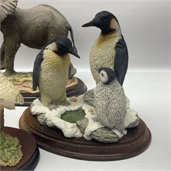 Border Fine Arts figure 'Two Owlets', together with Country Artists figures, 'Bull Elephant' and 'Penguin Family' and a Leonardo Border Collie group figure, tallest H22.5cm