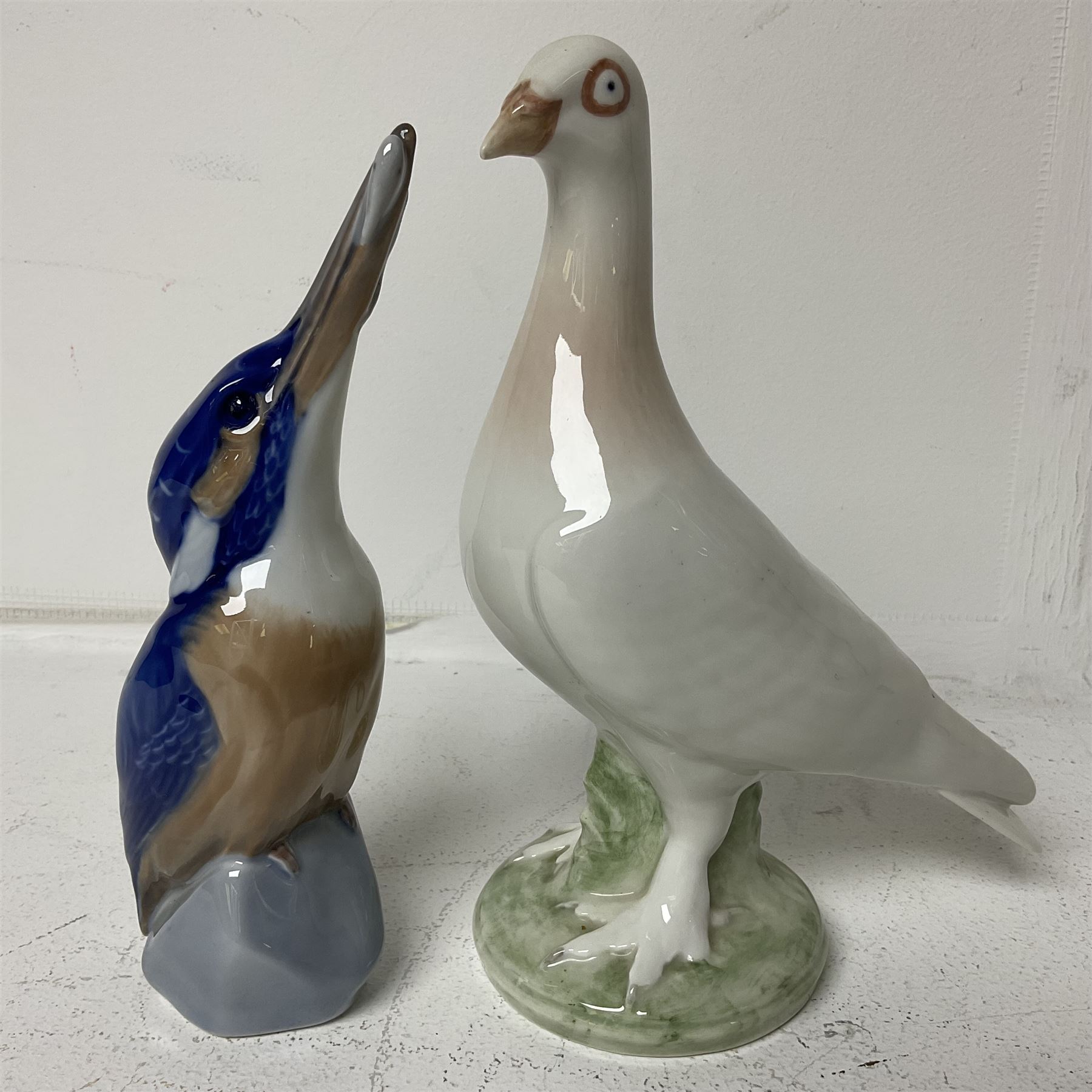 Seven Royal Copenhagen figures, including Arctic tern no 827, Swan no 755, Kingfisher no 2257 etc, together with Royal Copenhagen dish