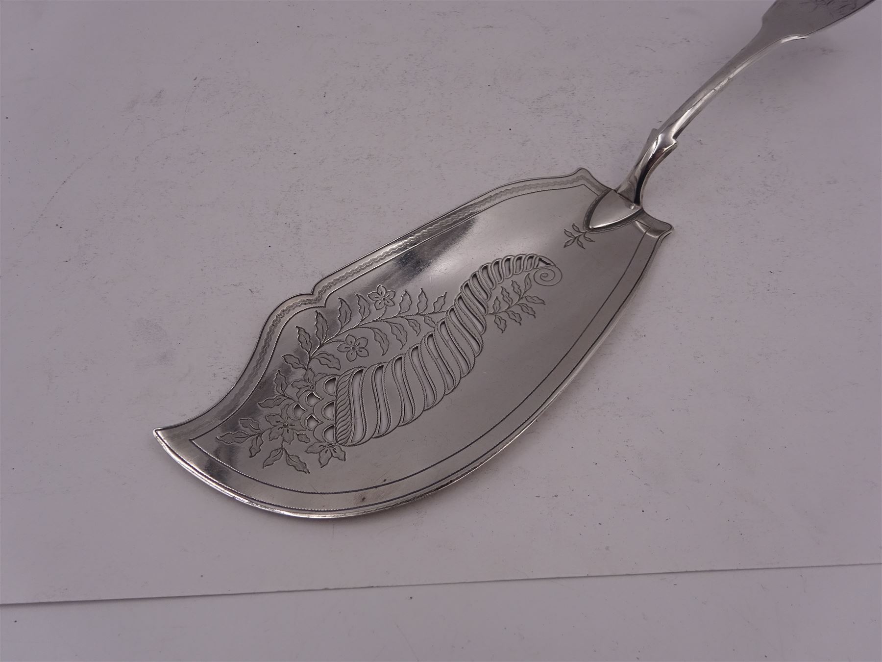 George III silver Fiddle pattern fish slice, engraved with floral pattern to blade and initials to terminal, hallmarked Thomas James, London 1814, L29.6cm