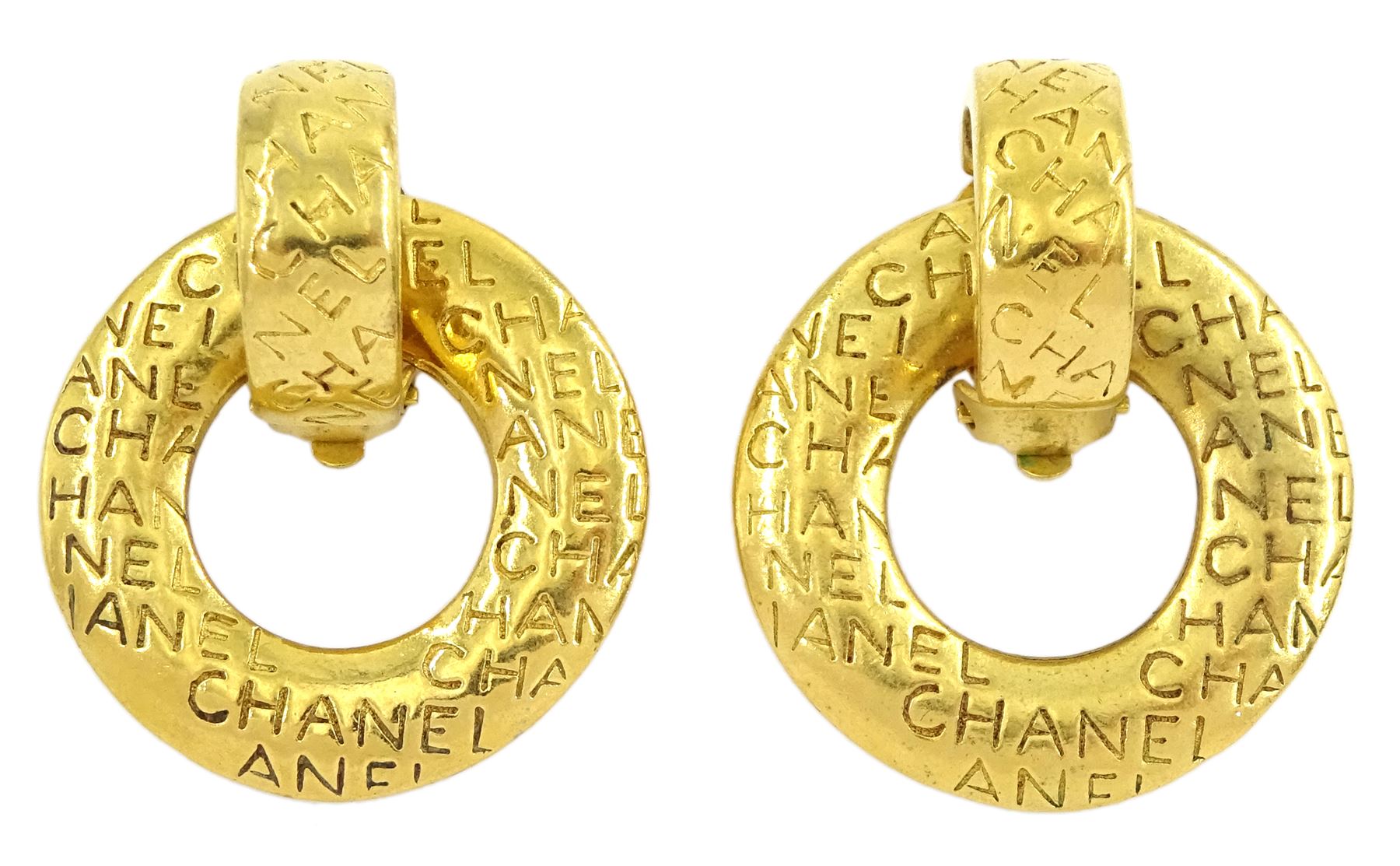 Chanel pair of gilt two in one clip-on earrings, with engraved 'Chanel' removable hoops, circa 1980's