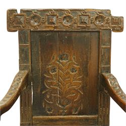 17th century Carolean oak Wainscot chair, the pokerwork cresting rail with carved geometric decoration, over a foliate carved back panel with arcade carved uprights, the arms with repeating guilloche carvings, raised on square chamfered supports united by castors