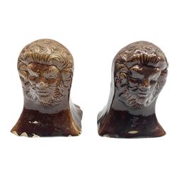 Pair of 19th century treacle glaze furniture/sash window rests modelled as lions, H12.5cm