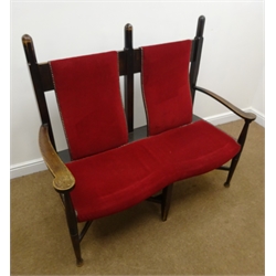  Arts & Crafts elm framed double back settee, upholstered back and seat in a red fabric, turned supports joined by an 'X' framed stretcher, W125cm  