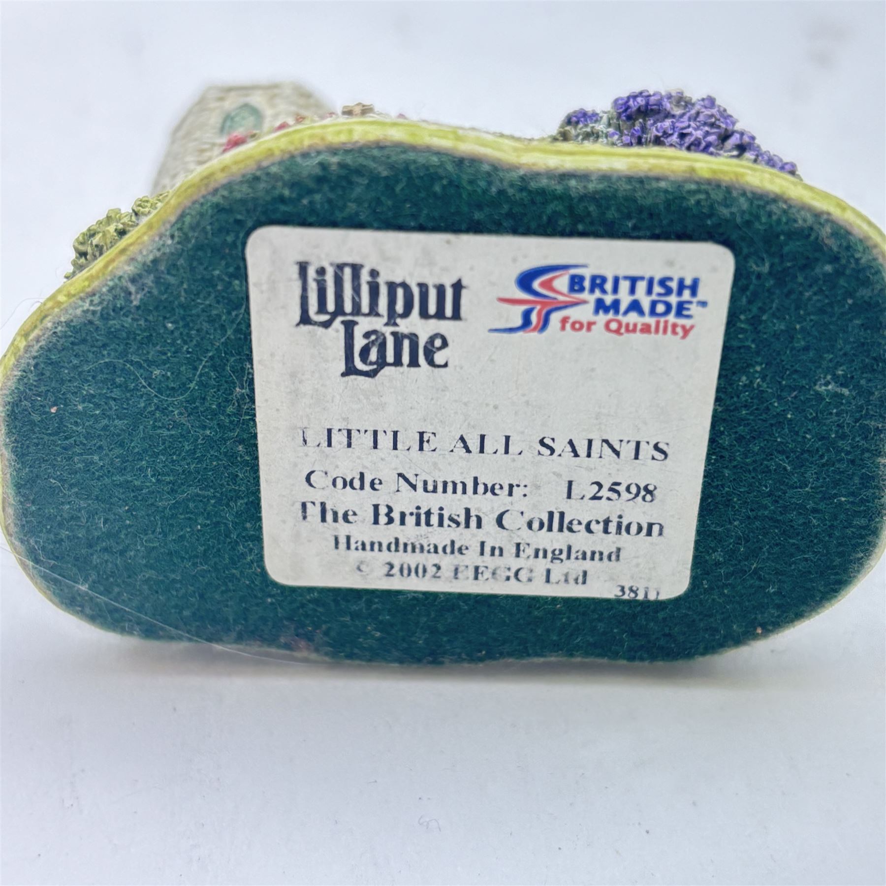 Eighteen Lilliput lanes, including Lundy Lighthouse, Bluebell Wood, St Marys, Winsor Cottage etc, all with original boxes and four limited edition Lilliput Lane prints 