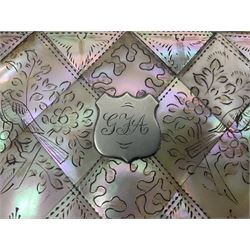 Victorian mother of pearl tea caddy, of rectangular bow-fronted form, the body with floral, bird and geometric engraved mother of pearl panels, white metal shield plaque to the cover inscribed with the initials G.J.A and similar escutcheon, the two division interior with ivory edging and two panelled mother of pearl lids, on four vegetable ivory bun feet L20cm, together with a similar style mother of pearl card case (2) This item has been registered for sale under Section 10 of the APHA Ivory Act