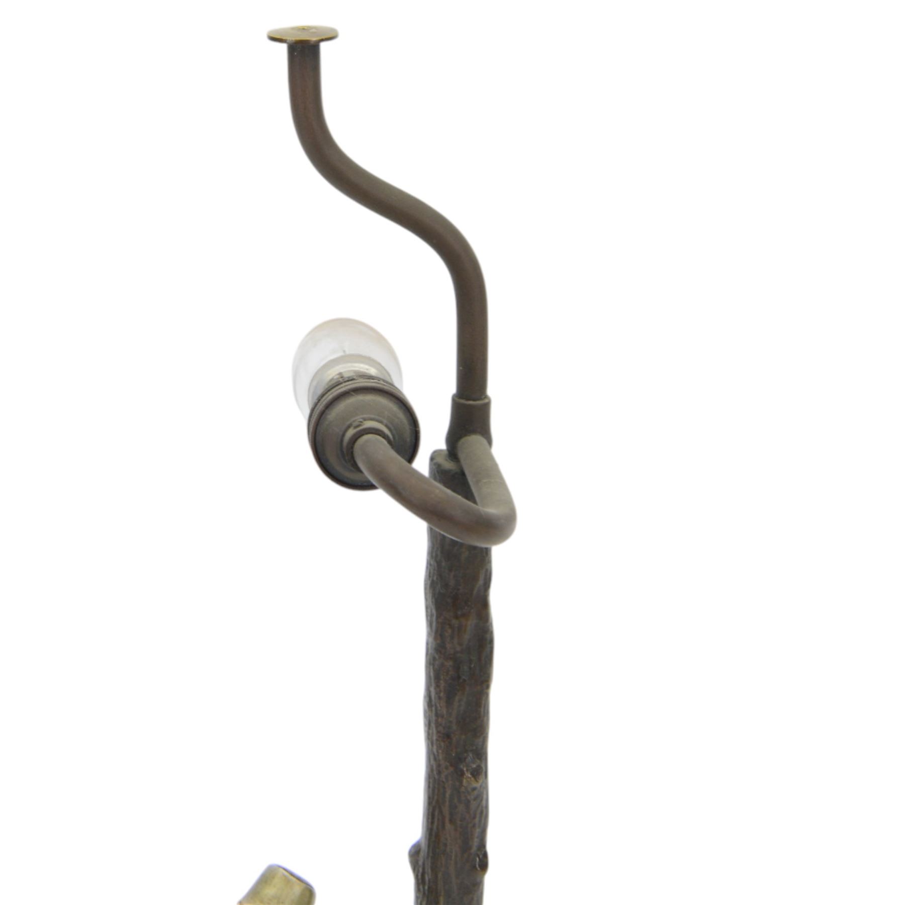 Professor Otto Poertzel (German, 1876-1963): gilt bronze and carved ivory figure, circa 1920-1930, modelled as a young dutch man seated upon a tree stump spreading to a naturalistically modelled rounded base, with light fitting behind modelled as a tree branch, supporting a circular cream and tasseled shade, signed in the case Poertzel, also bearing foundry mark RVM, including shade overall H43.5cm
This item has been registered for sale under Section 10 of the APHA Ivory Act