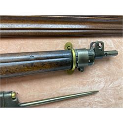 WW2 Lee Enfield No.4 Mk.1 .303 bolt-action rifle with hinged butt compartment, made by SA Ltd., Long Branch, Canada 1942, serial no.5L0646 L113cm; mounted on a framed display board with No.4 Mk.II spike bayonet, No.9 Mk.1 blade bayonet, two inert 5-round clips and brass biographical plaque by Antler Military Originals detailing DA Cert No.C3444 OLD STYLE DEACTIVATION SO FIREARMS CERTIFICATE REQUIRED OR RFD