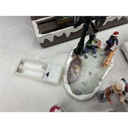 Christmas decorations; Premier LED Christmas Village scene with moving train, together with three Lumineo christmas scenes, and other similar 