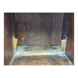 George III oak bureau, sloped fall-front enclosing a fitted interior with pigeonholes, small drawers, and a central compartment, over two short and two long drawers, brass escutcheons and drop handles, raised on bun feet