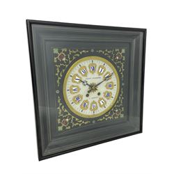 Auguste GP. Andhomme - French vineyard clock,  late 19th century 8-day twin train spring driven wall clock with enamelled and inlaid brass decoration within an ebonised and glazed case, circular enamel dial with cartouche Roman numerals, minute markers, pieced steel hands and a chased brass slip, striking movement, sounding the hours and half hours on a coiled gong. With pendulum and key.  
