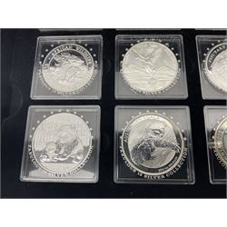 'The 2012 Fabulous 12 Silver Coin Collection' including Queen Elizabeth II Britannia one ounce silver two pound coin, Queen Elizabeth II Canada Maple Leaf one ounce silver five dollar coin, Queen Elizabeth II Australian Koala one ounce silver one dollar coin, Austrian Philharmonic one and a half euro coin, etc., in wooden presentation case