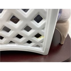 Lladro figure, Garden of Dreams, modelled as a woman reclining in front of trellis of flowers on a mahogany base, limited edition 3129/4000, sculpted by  José Puche, with original box, no 7634, year issued 1994, year retired 1996, H32cm