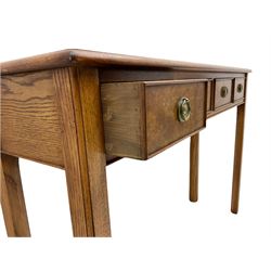 Contemporary figured walnut side table, moulded rectangular banded top over four drawers, square supports with outer mould and inner chamfer 