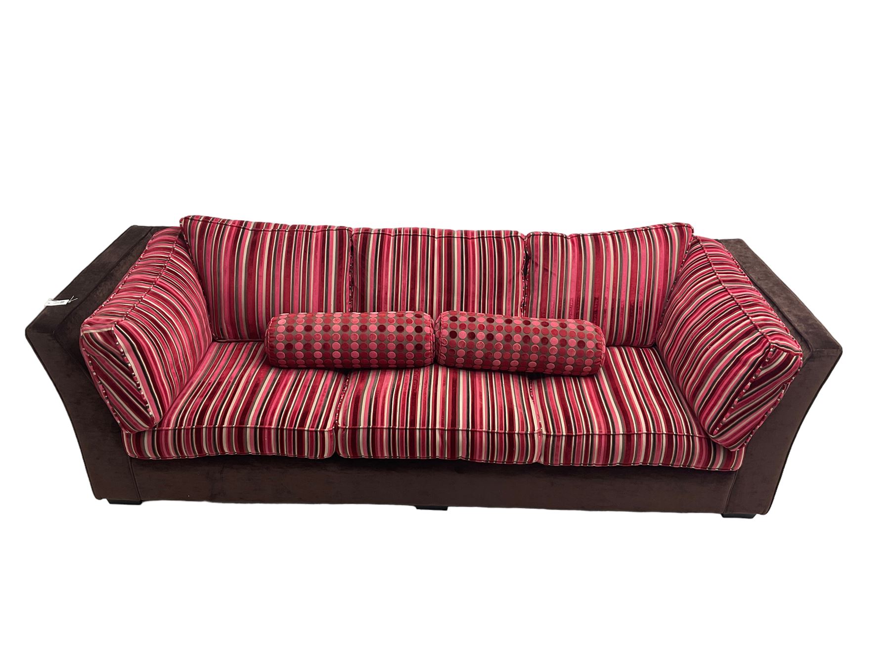 Collins & Hayes - grande three seat sofa upholstered in chocolate fabric, the loose cushions upholstered in textured fuschia stripes with contrasting spotted bolster cushions