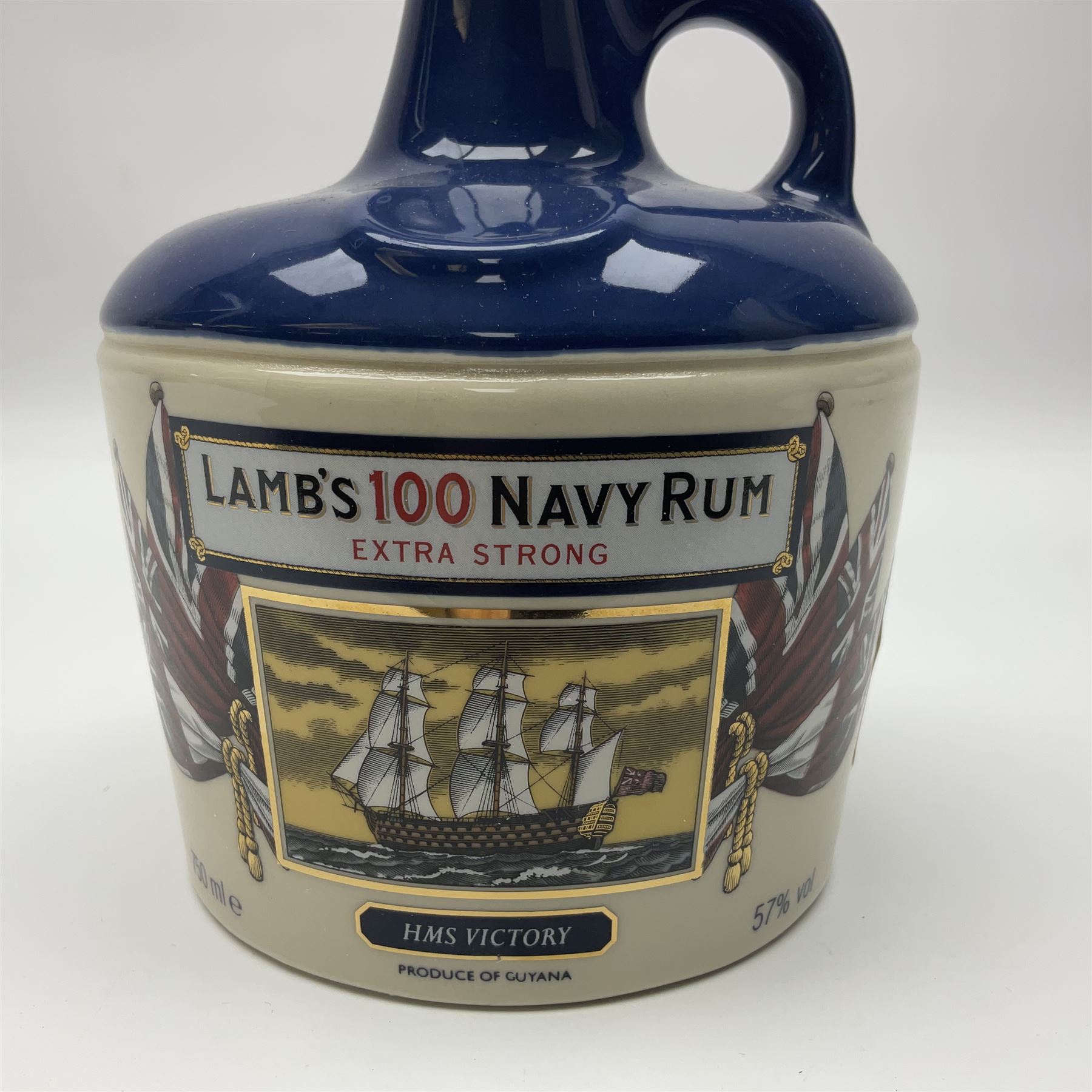 Lamb's 100 navy rum, 750ml, 57% vol, in a 'HMS Victory ceramic flagon and original box 