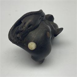 Two hardwood carved netsuke, the first example modelled as a water buffalo, the second a rat holding a bag of grain, H4cm