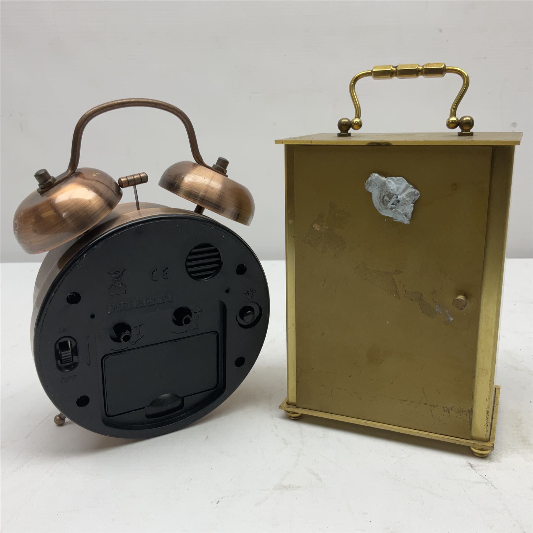 Avia Quartz mantle clock, a London alarm clock and a collection of coins