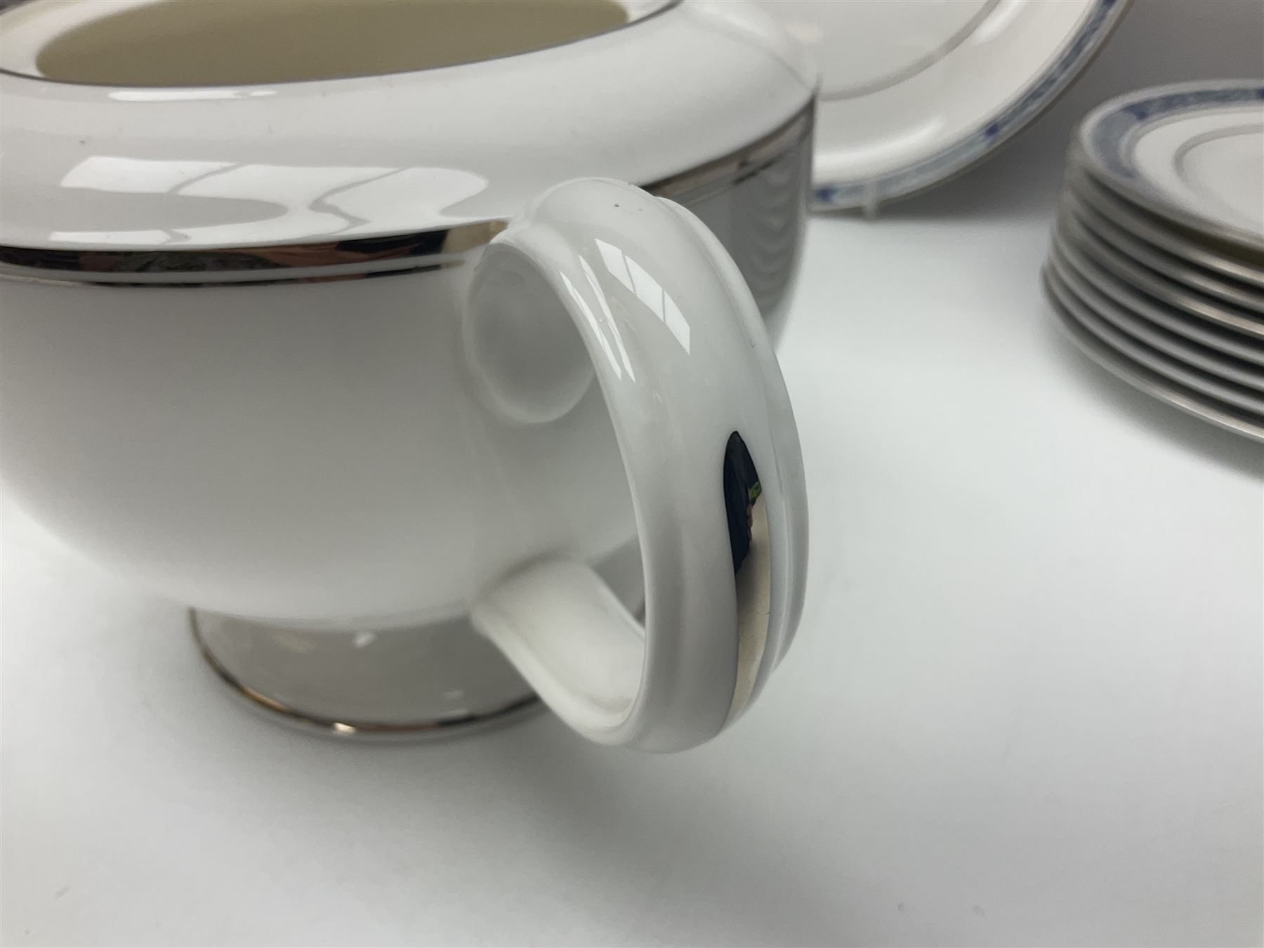 Royal Worcester Beaufort tea service, comprising teapot, milk jug, open saucier, eleven teacups, twelve saucers, eight dessert plates and one cake plate