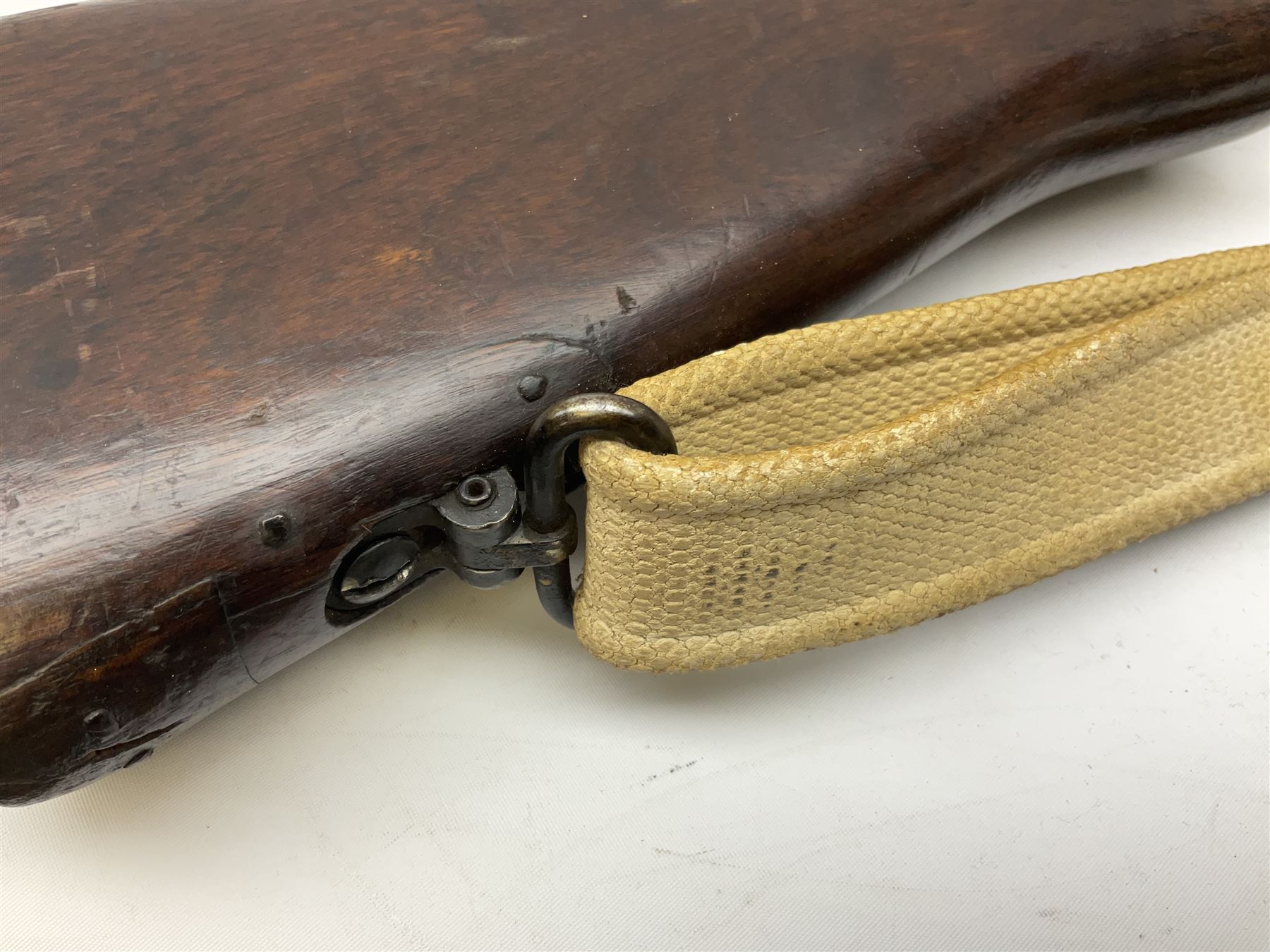 Lee Enfield SMLE .303 No.4 Mk.1* bolt action rifle with 63.5cm barrel and original webbing sling; lacking magazine; No.75C8419; L111cm overall; deactivated to early specification so requires re-deactivation to modern standards SECTION 1 RFD ONLY