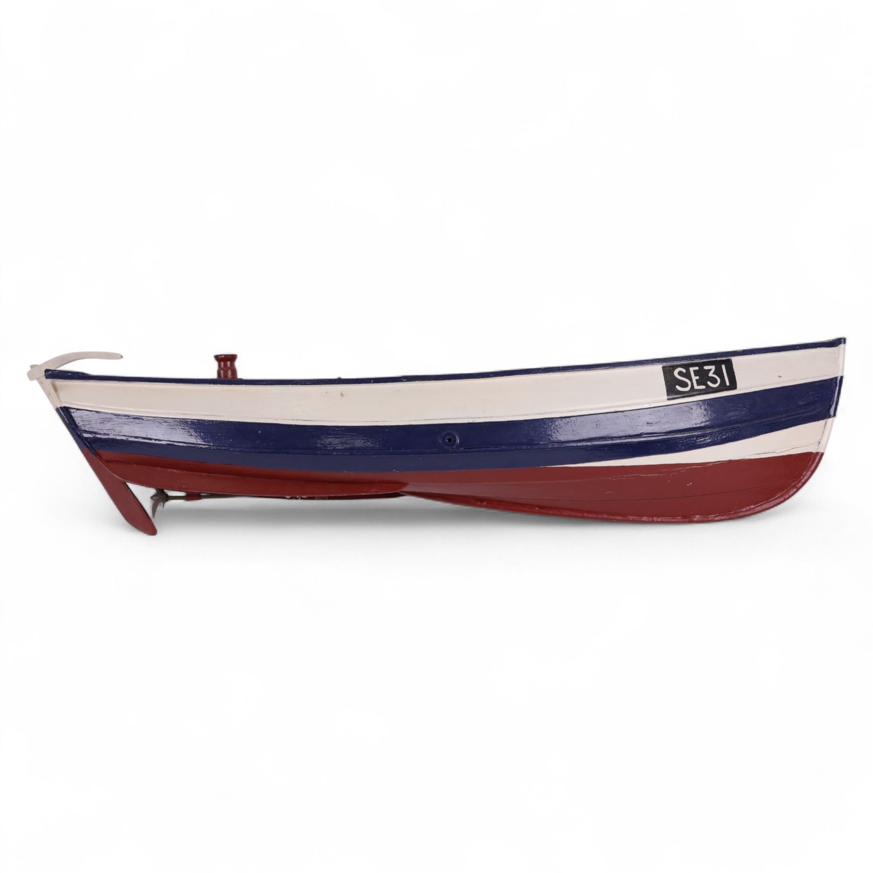 Two wooden fishing coble models, comprising SE31, with rudder, painted in blue, white and red and SSS.33 'Alice', painted in green, black and yellow, largest H16cm, L70cm