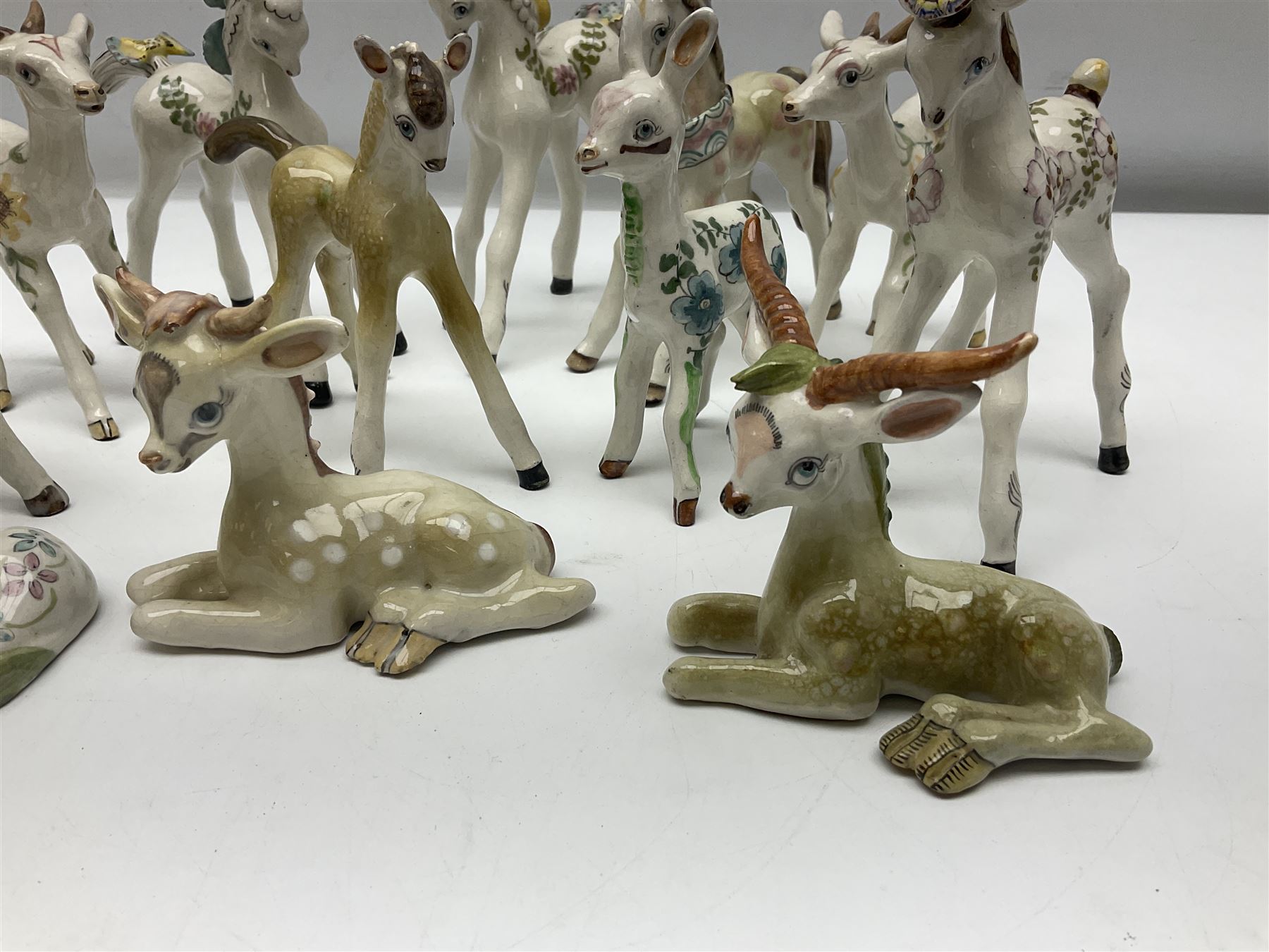 Basil Matthews figures, comprising horses, deer and fawns, all with painted mark beneath, largest H14cm
