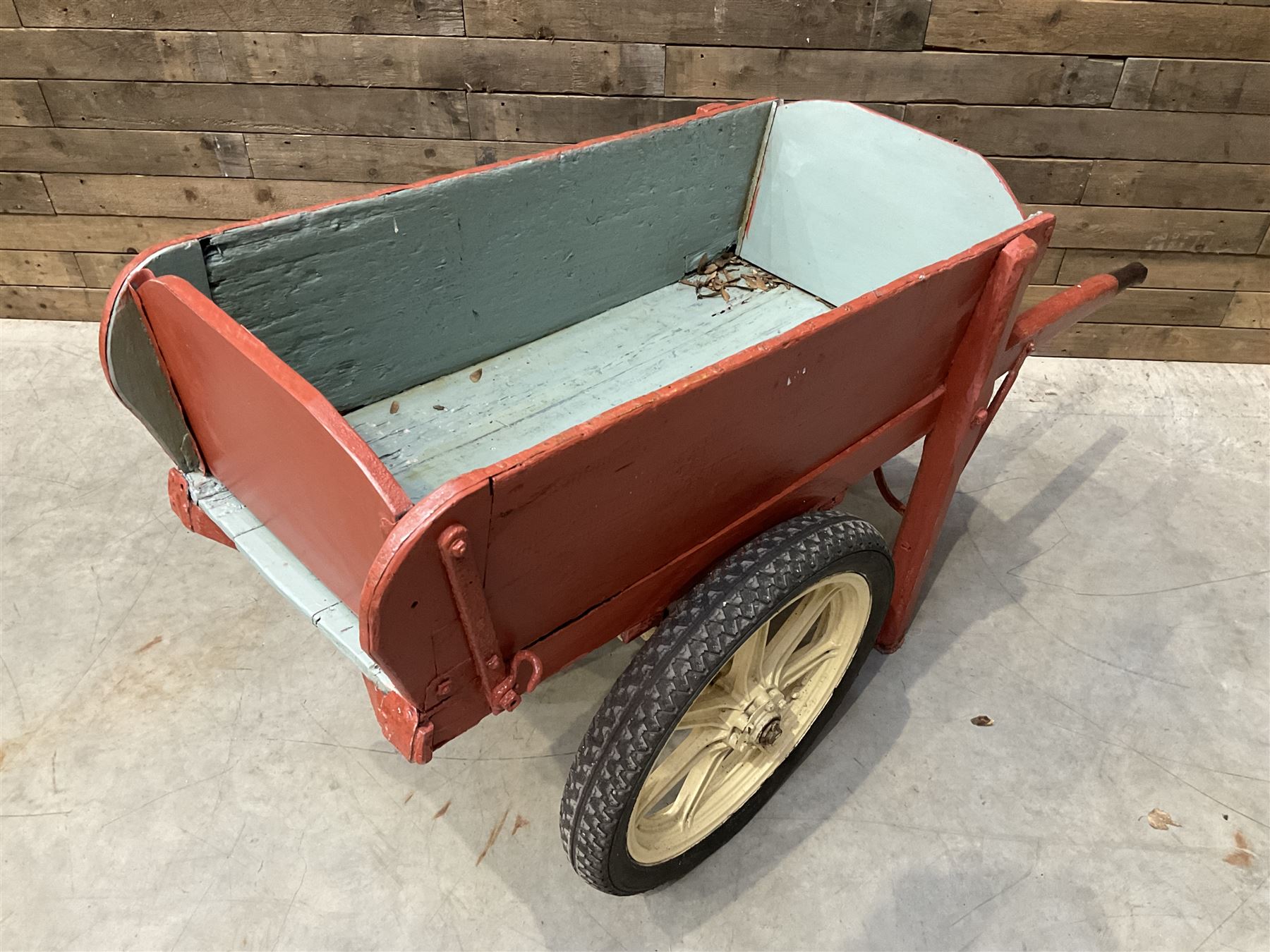 Painted timber hand cart on cast iron wheels