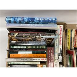 Large collection of hardback and paperback books, mainly military books, to include Band of Brothers, Dawn of D-Day, Dessert Warrior, Book of the Somme, Battle of Britain, etc in four boxes  