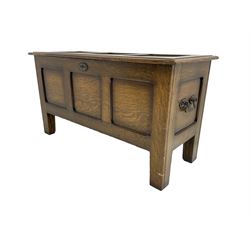 Small oak blanket box, triple panelled front and hinged lid, on stile supports