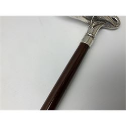 Art Deco style Italian 'Rivestito' covered silver walking stick handle, modelled in the form of a swan, stamped 'R', upon a silver collar hallmarked Birmingham 1986, makers mark DH-L, and hardwood shaft, L96cm

Provenance by vendor repute: 
This walking cane comes from a private collection amassed by the current vendors mother who was an Antique dealer specialising in walking sticks, working at the Portobello Road Antique Market in London for over forty years. 
In 1988 the prop crew from LWT (now ITV) visited Portobello Road looking for, amongst other items, a signature stick for David Suchet to use in his portrayal of Agatha Christie's Poirot. 
At the time this particular walking stick was one of five in possession. The prop crew chose and purchased another of the five which was then used by Suchet throughout all seventy episodes of the much loved series. 
Following the conclusion of the series Suchet was gifted his particular cane, which has been loaned to and can now be seen at the Agatha Christie Gallery at the Torquay Museum. 
