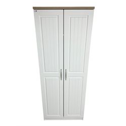 Oak and white finish double wardrobe, fitted with shelf and hanging rail