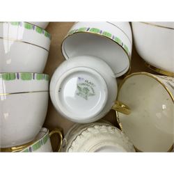 Tuscan China part tea service with purple and green decoration and gilt edging together with another part tea service 