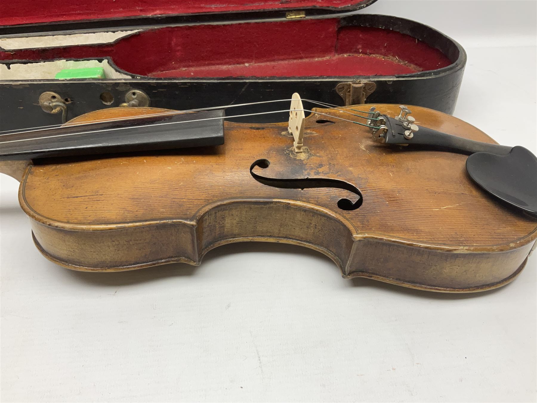 Late 19th century Saxony violin with 36cm one-piece maple back and ribs and spruce top; bears label 'Josef Klotz in Mittenwalde Anno 1795' L60cm overall; in ebonised wooden 'coffin' case