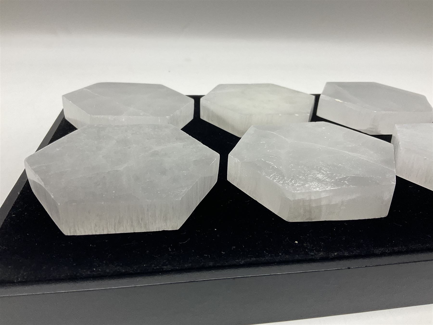 Set of six selenite hexagonal coasters, D7cm