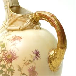 Victorian Royal Worcester ornamental ewer with gilded handle painted with floral sprays on a blush ivory ground H22cm