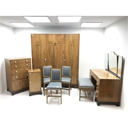  Art Deco walnut and marquetry bedroom suite by Gaylayde, comprising of an oak lined triple wardrobe, three doors enclosing fitted interior, shaped bracket supports (W171cm, H195cm, D56cm) a bedside cabinet, single door (W40cm, H77cm, D40cm) a chest, four drawers above two cupboard doors (W71cm, H113cm, D53cm) a dressing table, three piece mirror back, eleven drawers (W119cm, H140cm, D57cm) with stool and three chairs (W43cm)  