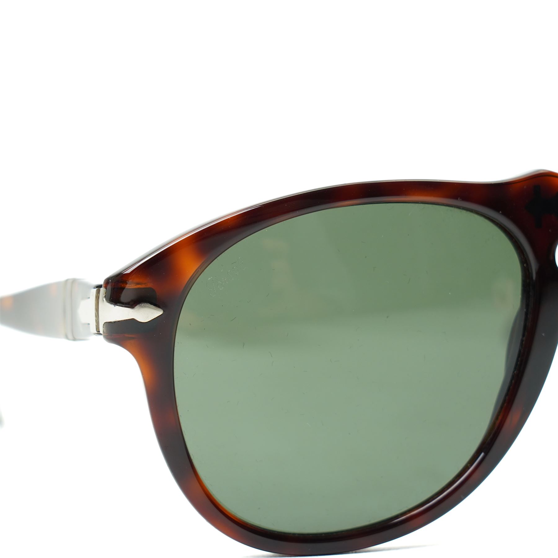 Persol tortoiseshell acetate sunglasses, handmade in Italy, with dark green lenses, signature silver-tone arrow hinges and keyhole bridge, temple interiors stamped Persol and CE marks, together with original Persol case and cloth