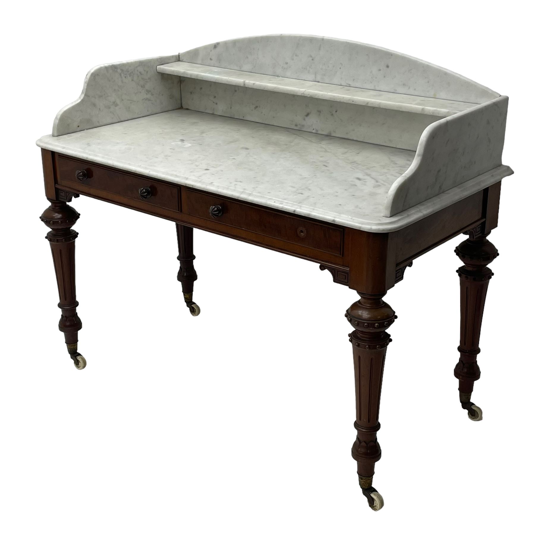 Victorian figured mahogany two-piece bedroom set - the washstand with white and black marble moulded top with arched back and raised shelf, two moulded frieze drawers, on turned and fluted supports with brass and ceramic castors (W123cm, D60cm, H102cm); the dressing table with raised swing mirror in moulded frame with shell and scroll carved pediment, on scrolled horns carved with foliage, four raised trinket drawers over moulded rectangular top, fitted with two drawers, on turned and fluted supports with brass and ceramic castors (W122cm, H177cm, D62cm)