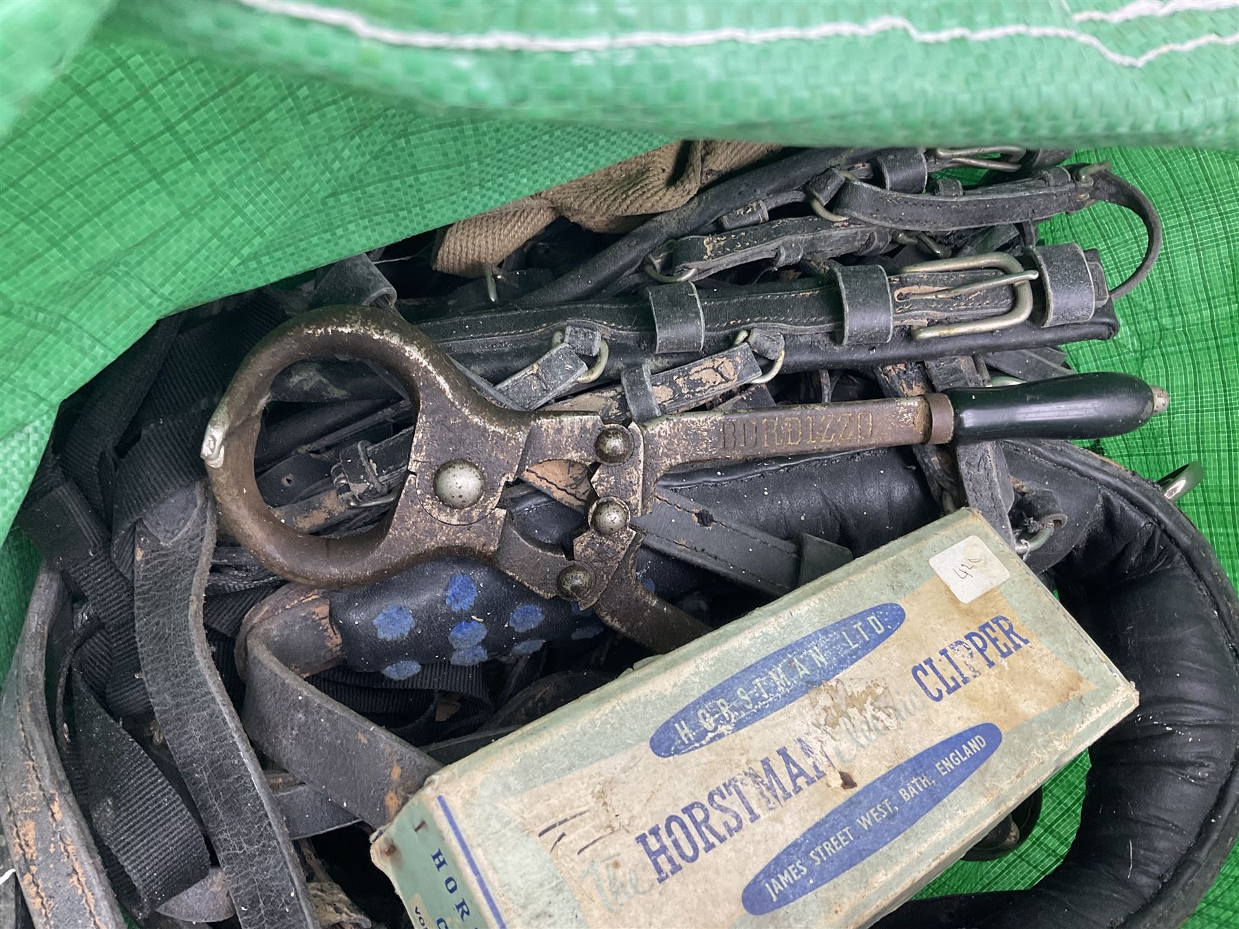 Quantity of horse tack and equipment to include Hauptner electric horse clippers, The Horseman Electric Clippers, bits, bridles, girths, rugs, jodpa boots etc  