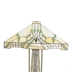 Tiffany style table lamp, the tapering stem and stepped pyramid shade, with naturalistic green foliate decoration on a cream ground, including shade H67cm