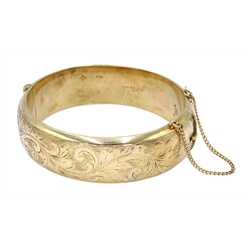  9ct gold bangle with engraved decoration, Birmingham 1987, approx 30gm  
