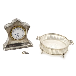  Silver cased Swiss Made dressing table clock by Joseph Gloster Ltd and a silver butter/preserve dish with glass liner, Birmingham 1910 (2)  