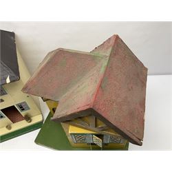 Two mid 20th century dolls houses, tallest H55cm