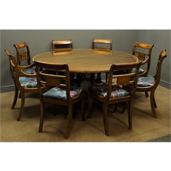 Regency style inlaid mahogany circular dining table, four square tapering supports joined by a platform on splayed supports, brass paw feet, (D154cm, H72cm) and set eight Regency style inlaid chairs (6+2) upholstered seats  