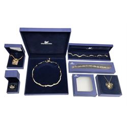 Swarovski jewellery including necklace and matching bracelet, heart pendant necklace, ring, necklace and one other bracelet, all boxed (6) and a collection of costume jewellery including necklaces, brooches and bracelets