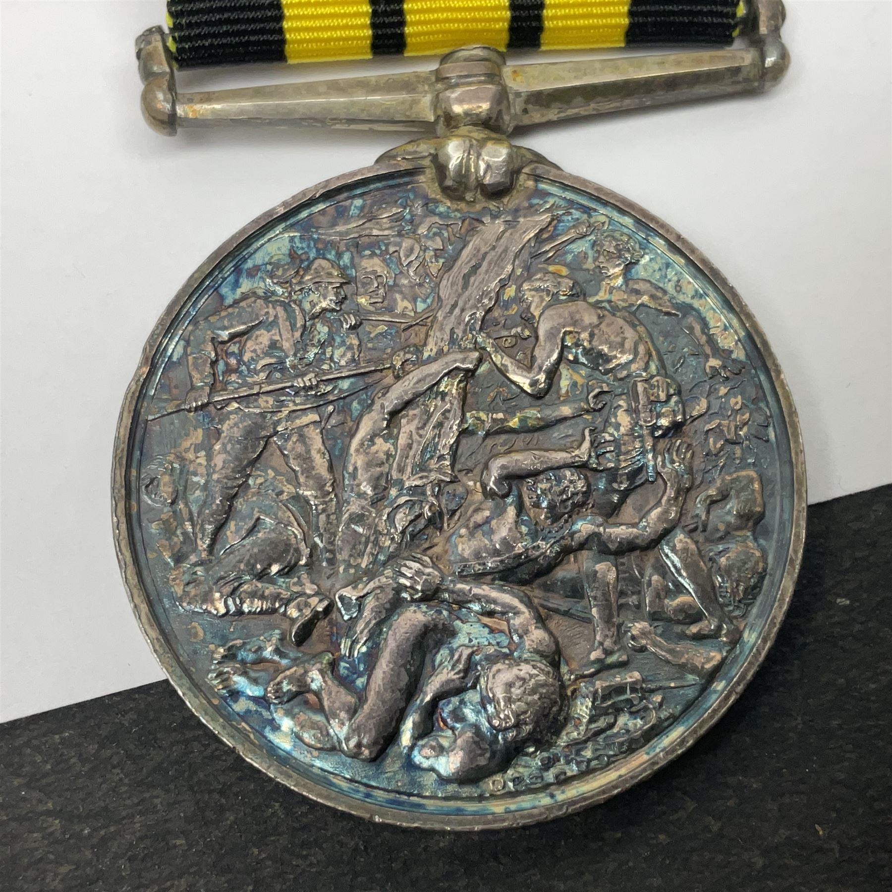Victoria Ashantee Medal 1887-1900 awarded to W. Gray Ord. H.M.S. Encounter 73-74; with replacement ribbon but original present.
